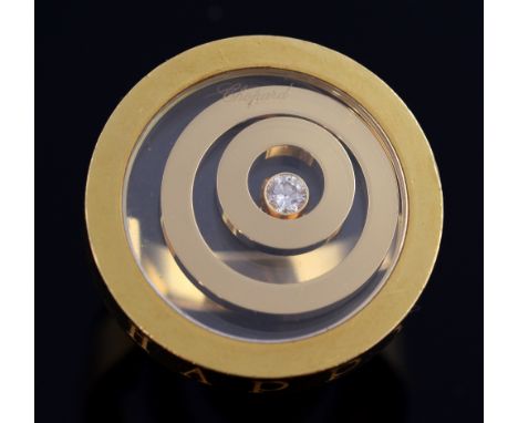 Chopard Happy diamond ring, the 'floating' diamond within concentric circles, encased in glass, signed  .   Good condition, s