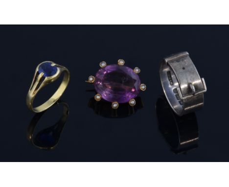 Antique amethyst and seed pearl brooch, synthetic sapphire ring and a Victorian silver belt ring. .   