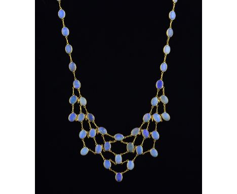 Contemporary opal fringe necklace, with oval cabochon cut stones united by fine gold chain, 14ct, length 40 cm  .   Length 40