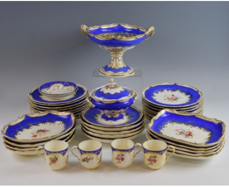 19th century English porcelain dinner service, hand painted with floral sprigs, with blue and gilt scrolling borders, compris