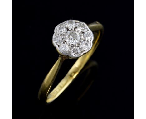 Art Deco diamond cluster ring, set with nine old cut diamonds mounted 18ct, ring size N .   Gross weight 2.2 grams