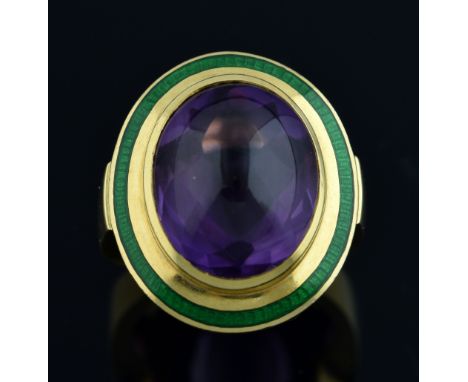 Leo De Vroomen amethyst and enamel ring, set with a cabochon cut amethyst with a gold border and green enamel surround, hallm