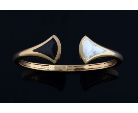 Bulgari, Diva bracelet  inset with mother of pearl and onyx in 18 ct gold, signed and numbered .   