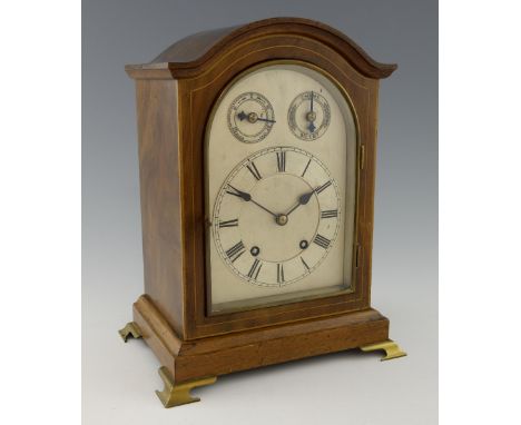Mahogany cased twin train bracket clock, the silvered dial with Roman numerals, Slow/Fast dial and Chime/Silent dial, strikin