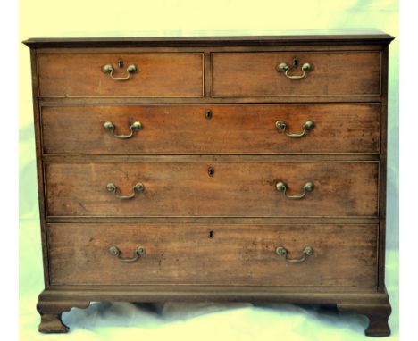 19th century mahogany chest of two short and three graduated long drawers on ogee bracket feet. 128cm x 55cm x 107cm.   