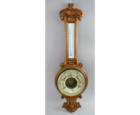 19th century heavily carved oak barometer, 80cm high.   