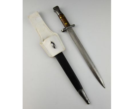 Victorian Martini Henry bayonet with two-stud grip. scabbard and frog, blade 30cmProvenance:- From the estate of an Officer i