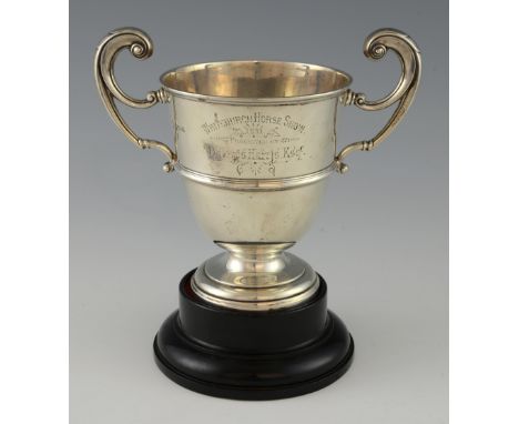 A George V silver two handled presentation cup, with inscription and on associated base, by William Hutton & Sons Ltd, Birmin