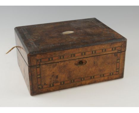 19th century walnut writing box, the cover with marquetry border and mother-of-pearl plaque, the interior lined with purple v