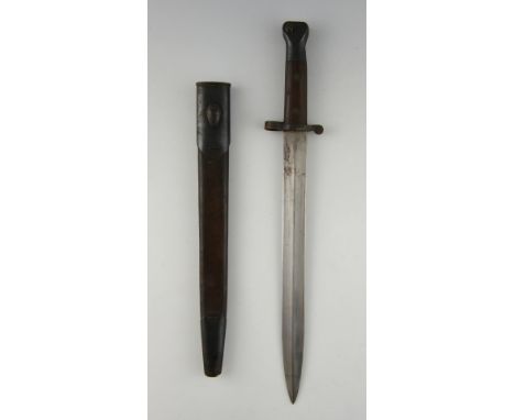 Bayonet in leather scabbard, the blade, 31 cms.  .  