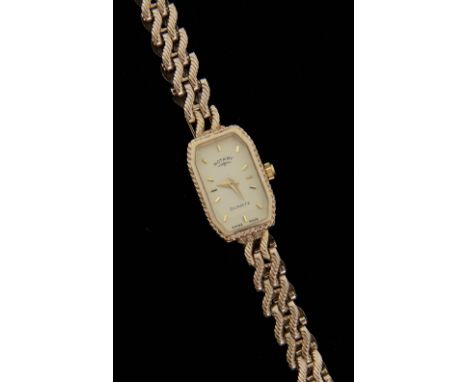 Rotary gold bracelet, with rectangular champagne dial,  watch, 9 ct, boxed .   Overall in good condition, small scratches to 