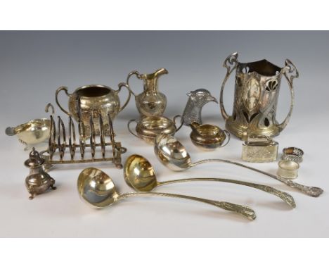 Selection of silver plated wares to include a wine cooler, Art Nouveau style bottle stand, toast rack, entree dish, toast rac