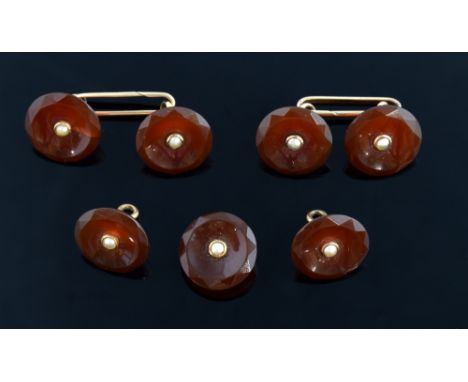 A pair of antique double link cornelian cufflinks, each set with a round hard stone cornelian and a single pearl to the centr