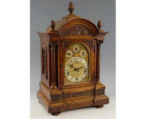 Late 19th century oak cased bracket clock, with brass and silvered dial and three train barrel movement, Chime/Silent dial, F