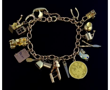 Gold charm bracelet, with eighteen  gold charms, including a fine gold Austrian one Ducat coin, 23 ct, diary, cat and fiddle,