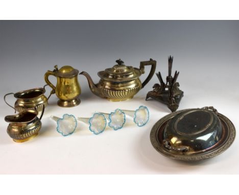 Silver plated centre piece with four detachable pale blue glass vases on a triangular base, surmounted by three winged  horse