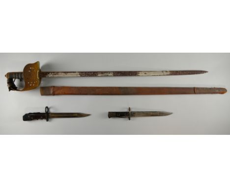 Officer's sword in leather scabbard (very rusty) and two  small bayonets.  .  