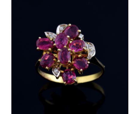 Ruby set cocktail ring with small diamonds, tested as 18 ct gold, ring size L  .   Gross weight 3 grams