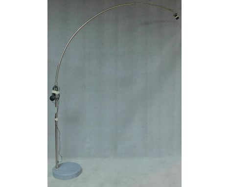 A chromium floor standing arc lamp on marble base, lacks shade. H.220 W.38 D.38cm 