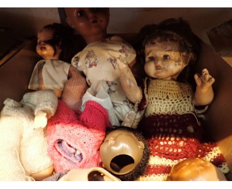 Box of mixed vintage dolls including ceramic headed examples with some clothing all A/F