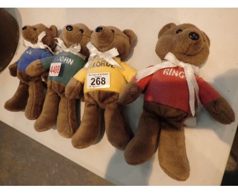 Four Beatles Story teddy bears from Albert Dock Liverpool