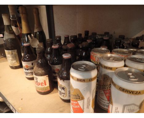 Shelf of assorted beers and wine