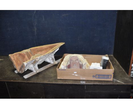 TWO ARCHITECTURAL PLASTER MOULDS and two plaster plinths formed from one of the moulds, the largest mould being 80cm long 38c