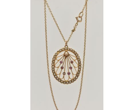 A YELLOW METAL RUBY AND SEED PEARL LAVALIER PENDANT AND CHAIN, oval open work pendant, set with five small rubies (one missin