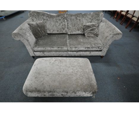 A DFS GREY UPHOLSTERED TWO PIECE SUITE, comprising a two seater sofa, with scrolled arms, length 213cm x depth 95cm x height 