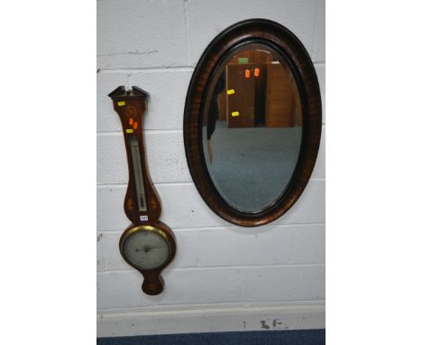 A 19TH CENTURY MAHOGANY AND SHELL INLAID BANJO BAROMETER, fitted with a thermometer, above a seven inch silvered dial, labell