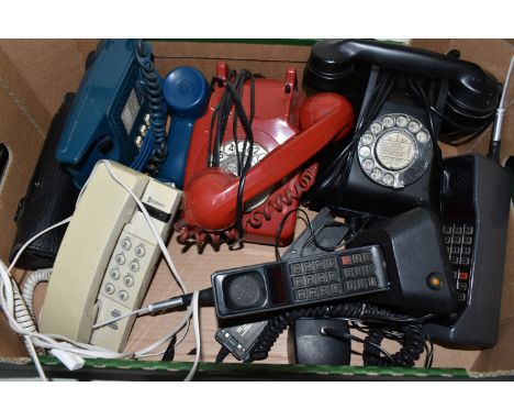 A BOX OF SEVEN VINTAGE TELEPHONES, comprising a black rotary dial phone with pull out draw, converted for modern use, Red rot