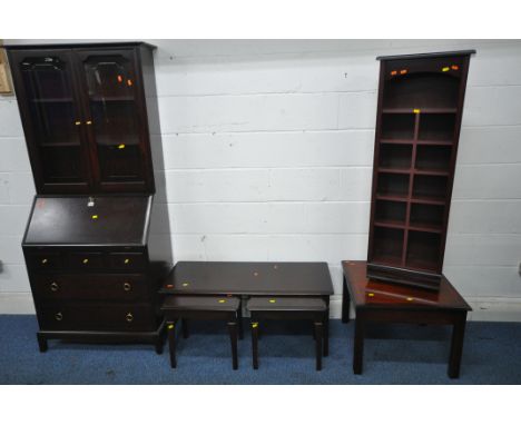 A STAG MINSTREL BUREAU BOOKCASE, the top with two glazed doors, enclosing two adjustable shelves, the base with a fall front 