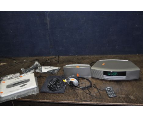 A BOSE WAVE MUSIC SYSTEM with DAB module and remote, a pair of TP-1A headphones, manual and cables (PAT pass and working) REM
