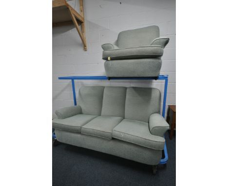 A TEAL UPHOLSTERED TWO PIECE LOUNGE SUITE, comprising a three seater sofa 188cm x depth 90cm x height 90cm, along with an arm