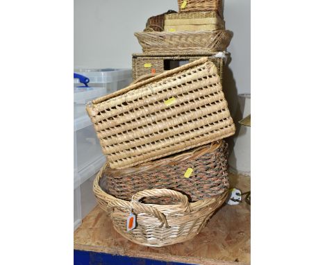 A COLLECTION OF BASKETS, fourteen baskets of different shapes, sizes and materials, including a small laundry hamper measurin