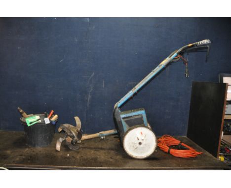 A VINTAGE GARDEN MASTER ELECTRIC ROTAVATOR (PAT fail due to uninsulated plug but working) (tiller remove for storage)and a bu