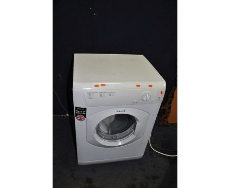 A HOTPOINT TVHM80 TUMBLE DRYER with pipe width 60cm depth 54cm height 85cm (PAT pass and working)