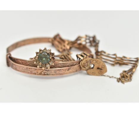 A SMALL ASSORTMENT OF YELLOW METAL JEWELLERY, to include an AF gate bracelet, fitted with a heart padlock clasp, a distorted 