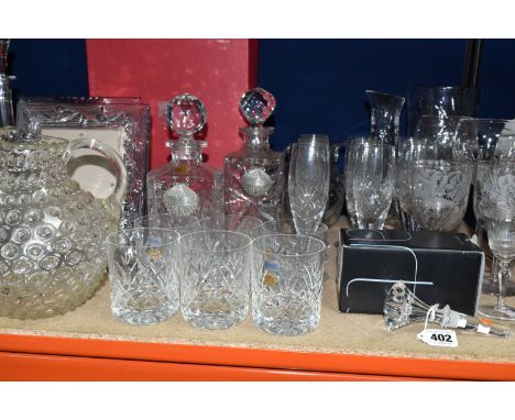 A QUANTITY OF CUT CRYSTAL GLASSWARE, comprising a boxed Stuart Crystal 'Starburst' bottle stopper, a set of six Schott Crysta