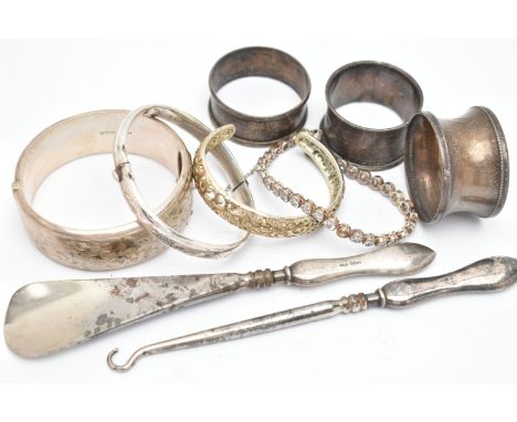 SILVER BANGLES, NAPKIN RINGS AND OTHER ITEMS, to include a silver wide hinged floral bangle, push button clasp with additiona