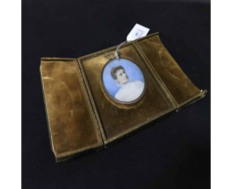VICTORIAN PORTRAIT MINIATUREof a lady, in a rolled gold frame and with original fitted case