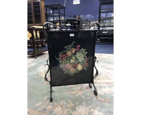ARTS & CRAFTS WROUGHT METAL AND HAMMERED COPPER FIRESCREEN inset with a later needlework panel of fruit, within within scroll