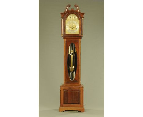 A large Edwardian mahogany longcase clock, with three train movement striking on nine gongs, with Whittington &amp; Westminst