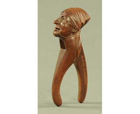 A 19th century Italian nutcracker, incised "Monte-Generoso".  Height 20 cm.