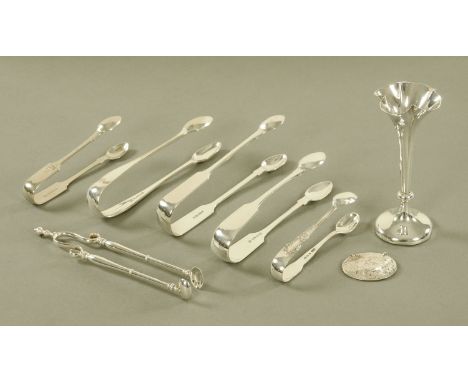 Six pairs of sugar tongs, three silver including one Edinburgh 1856 with turned finial, together with a small weighted specim