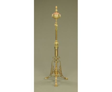 A late 19th/early 20th century brass and copper lamp standard, converted to electricity.  Height to top of light fitting 151 