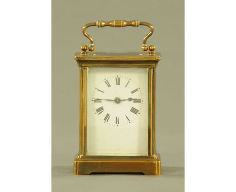 A brass cased carriage clock, timepiece only.  Height excluding carrying handle 11 cm. 