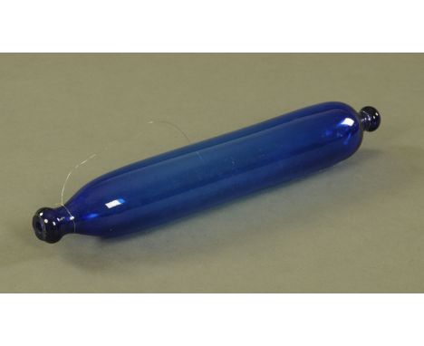 A 19th century Bristol blue glass rolling pin.  Length 34 cm.