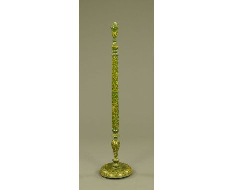 A lacquered lamp standard, green foliate patterned with circular base.  Height 151 cm. CONDITION REPORT: This lamp standard i