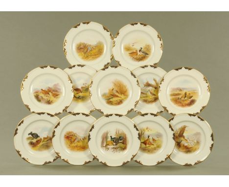 A Royal Worcester dessert service, handpainted with birds by Johnson, including pheasant, plover, grouse, partridge, capercai